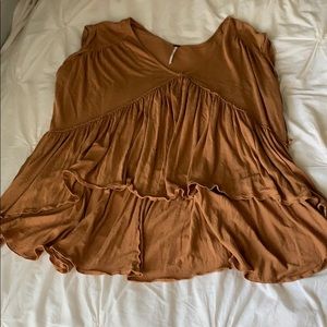 Free people burnt orange high-low top.